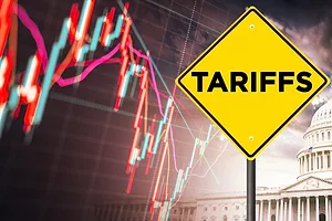 A diamond-shaped yellow street sign that reads "TARIFFS," set against a visualization of a red line graph and an image of the U.S. Capitol building